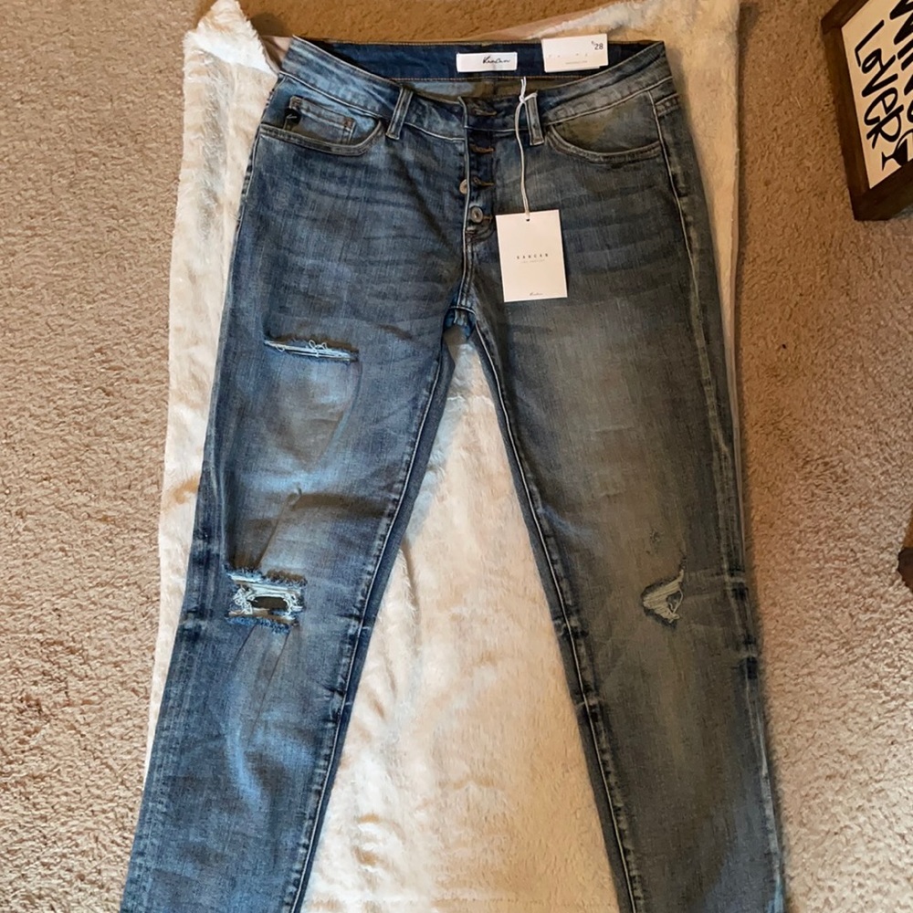 KanCan relaxed fit 5 button distressed jeans.